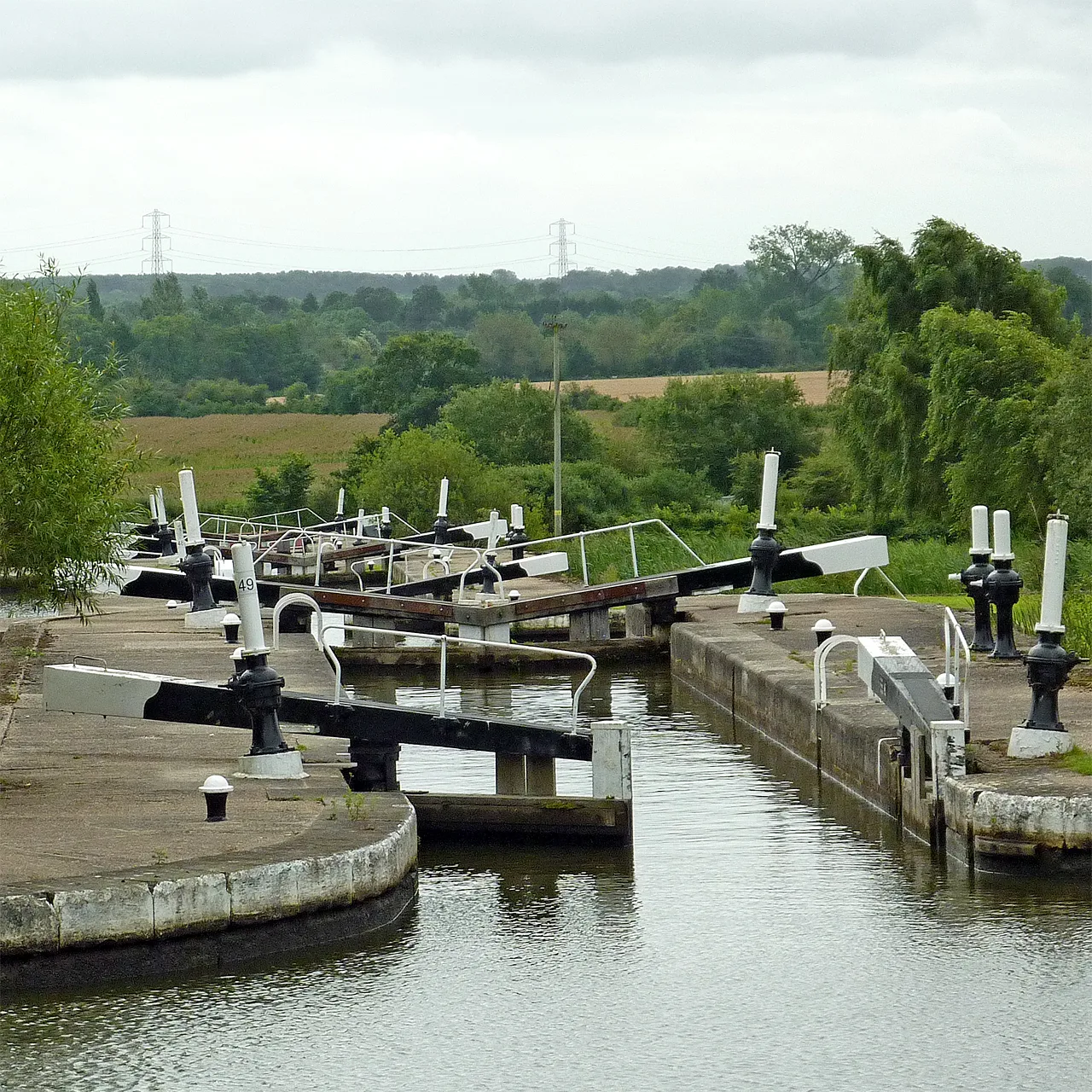 The flight of locks on the Grand Union Canal near Knowle, with open farmland beyond. The updated assessment grades green belt land across the borough.